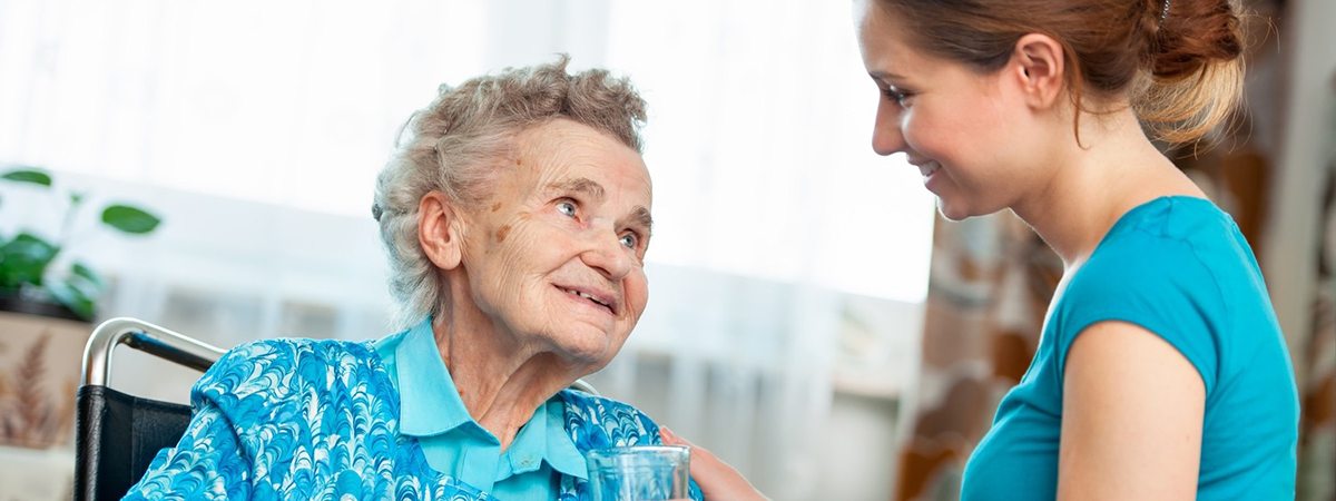 Home Care Brisbane - Women Wearing Blue Shirt Caring For Elderly Women